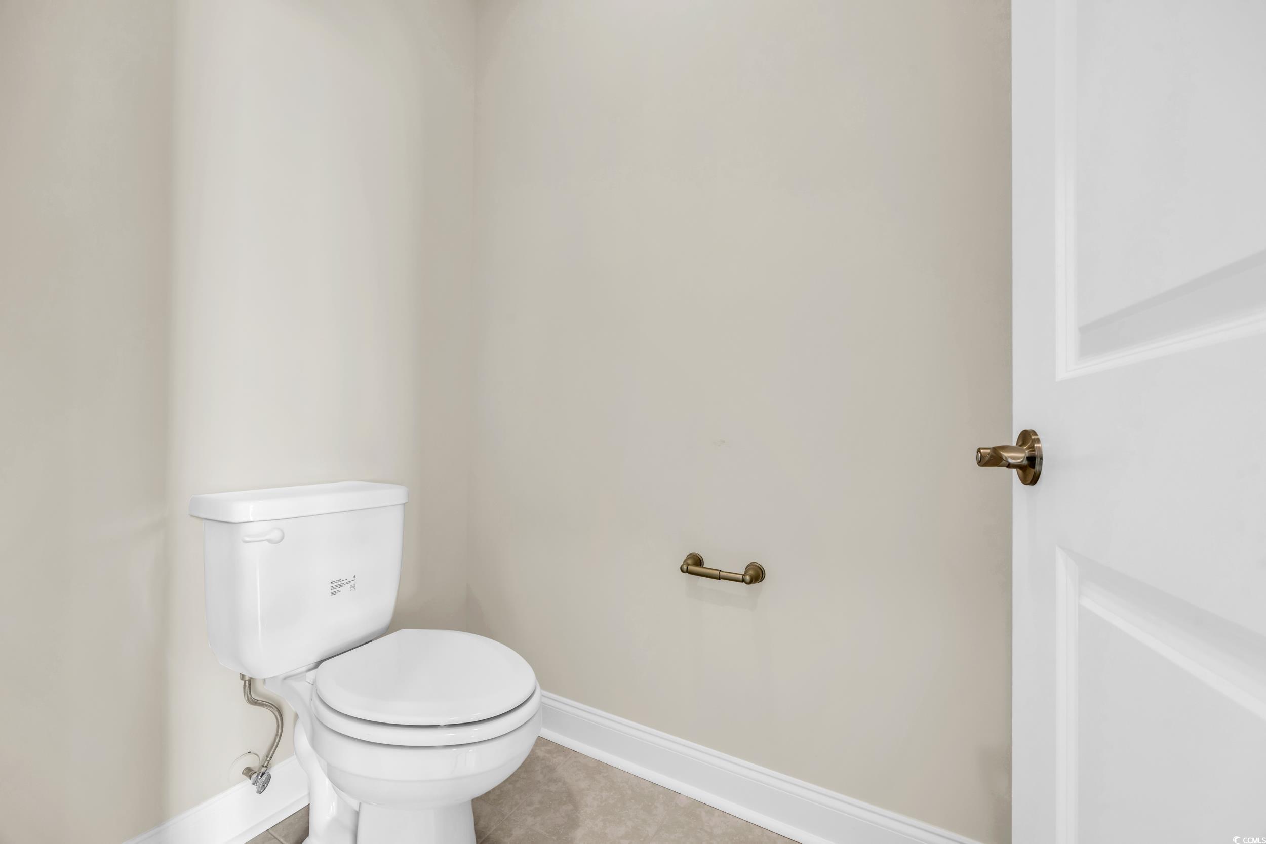 547 Beckham Court Murrells Inlet, SC 29576 - Photo 20 of 40 Bathroom with toilet and tile patterned floors
