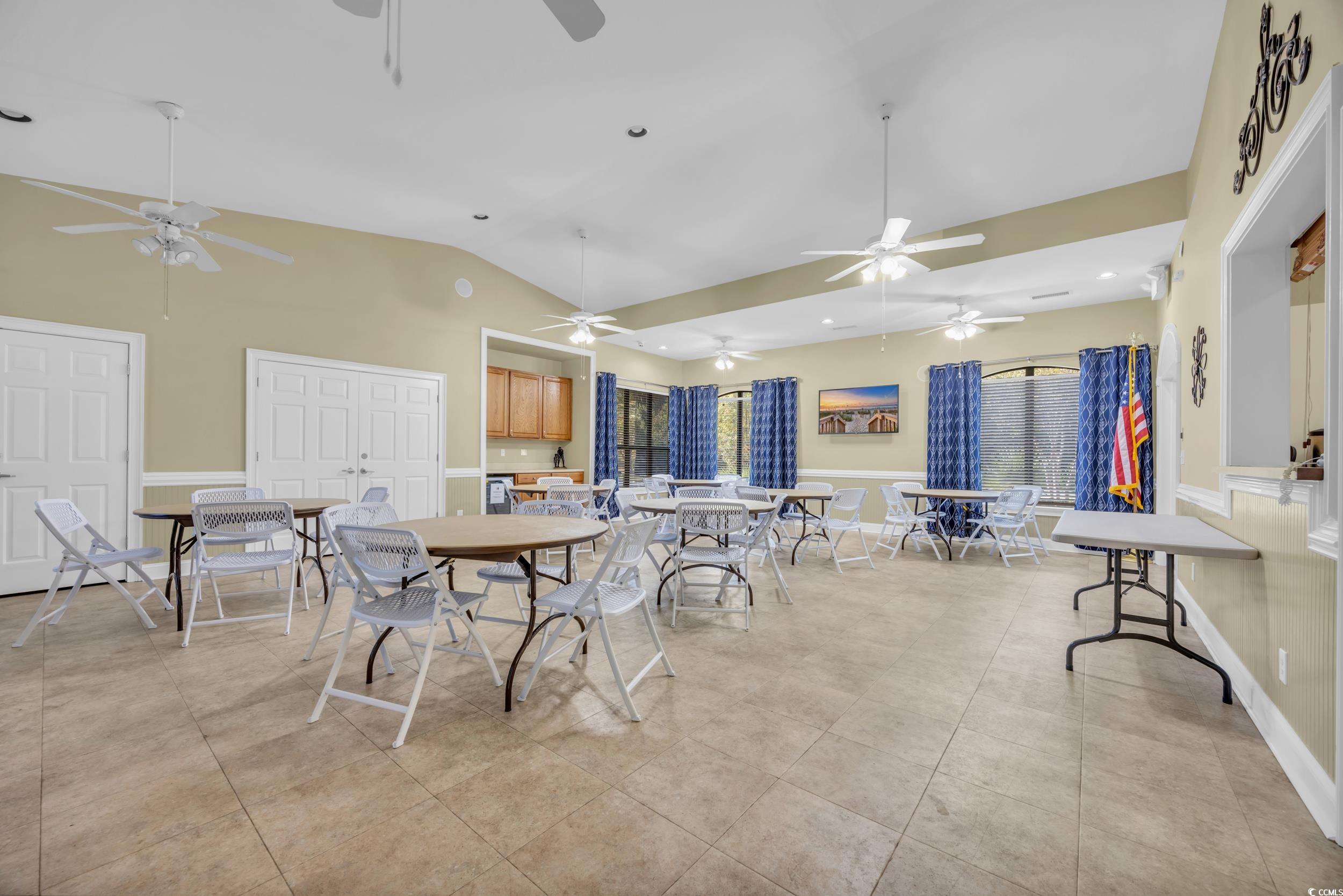 547 Beckham Court Murrells Inlet, SC 29576 - Photo 36 of 40 Tiled dining room featuring vaulted ceiling