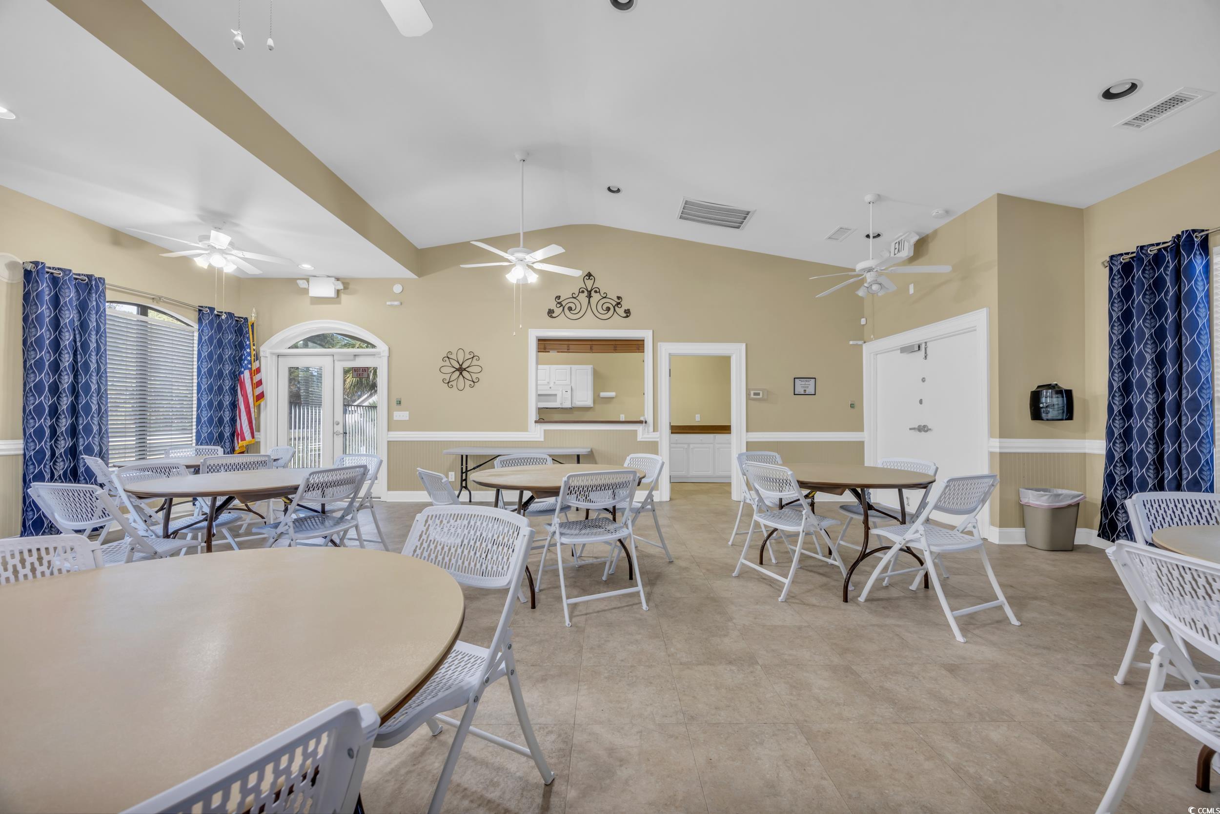 547 Beckham Court Murrells Inlet, SC 29576 - Photo 37 of 40 Dining area featuring ceiling fan and vaulted ceil
