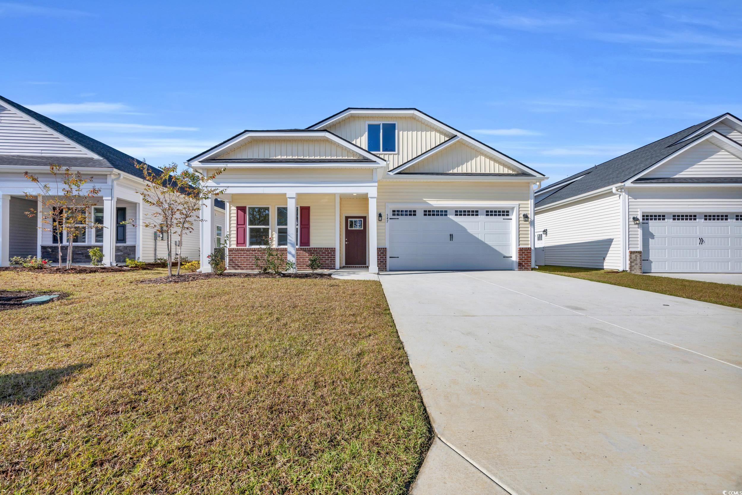 547 Beckham Court Murrells Inlet, SC 29576 - Photo 4 of 40 View of front facade featuring a porch, a front la