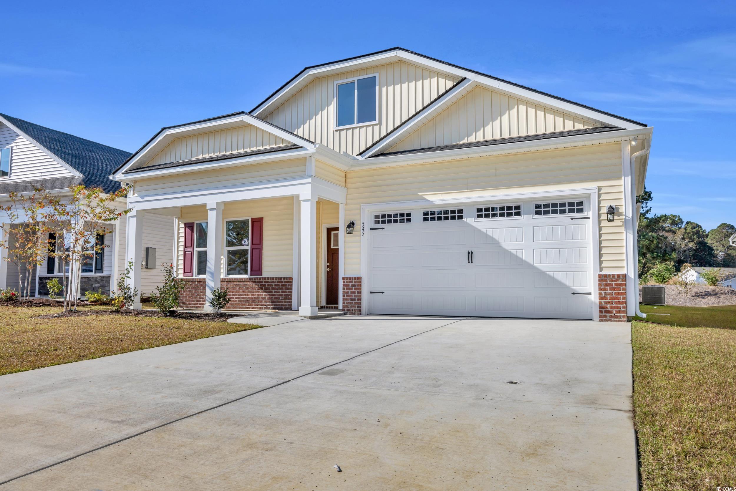 547 Beckham Court Murrells Inlet, SC 29576 - Photo 5 of 40 View of front of home featuring covered porch, a f