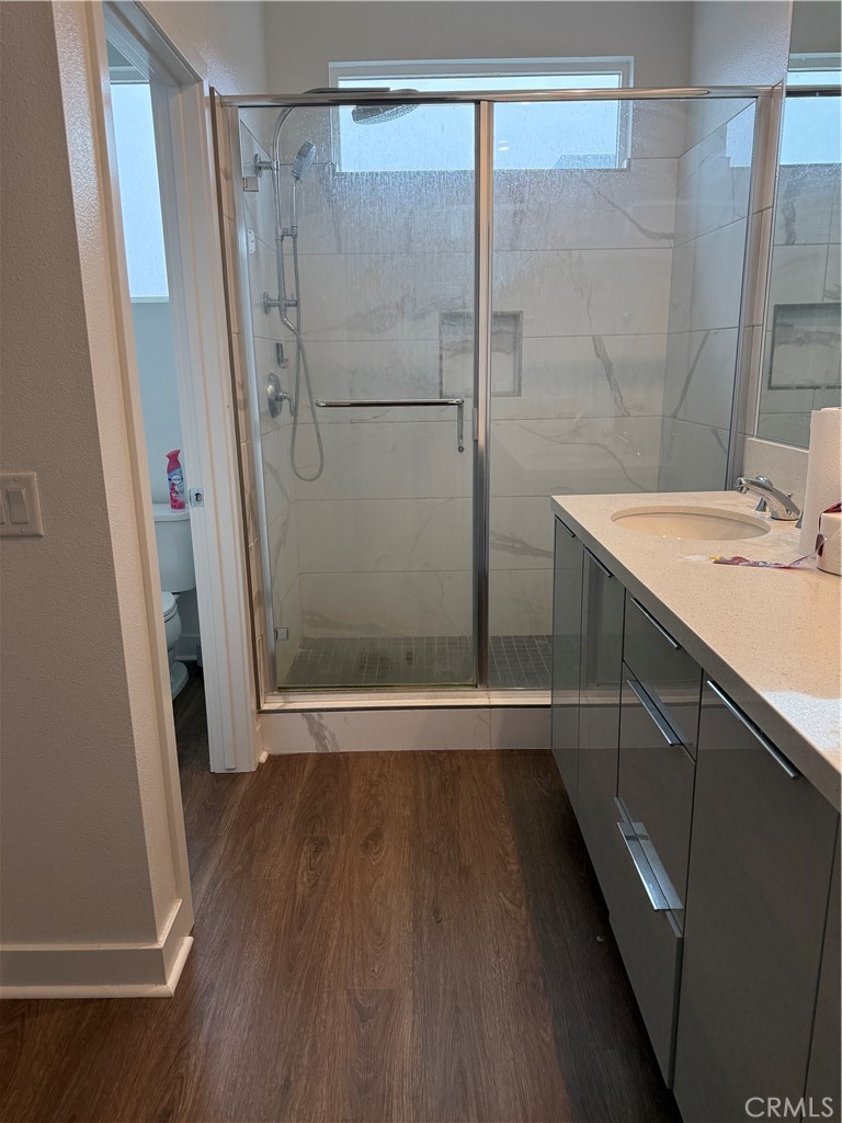 1402 West Bushell Street Anaheim, CA 92805 - Photo 9 of 10 a bathroom with a shower and a sink