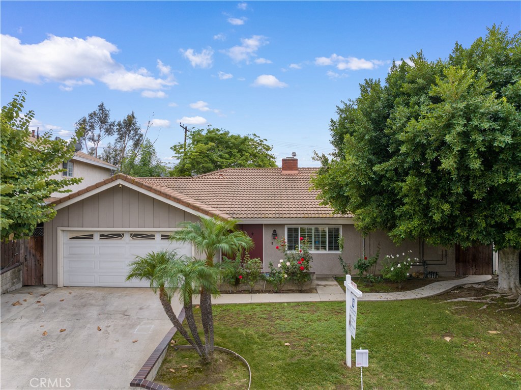 24124 Decorah Road Diamond Bar, CA 91765 - Photo 1 of 1 a front view of a house with garden