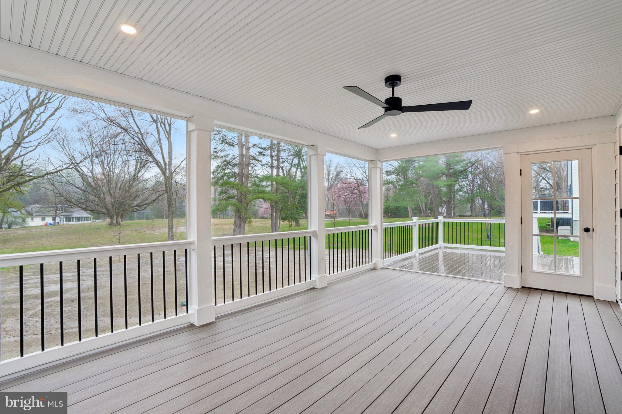 211 Bella Vista Road Devon, PA 19333 - Photo 16 of 16 a view of an empty room with wooden floor and balcony