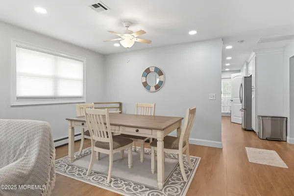a view of a dining room with furniture