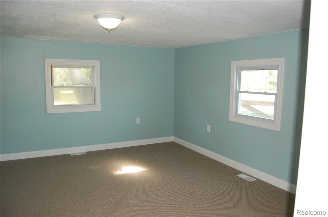 27004 Inkster Road Flat Rock, MI 48134 - Photo 12 of 36 1st Floor Main Bedroom