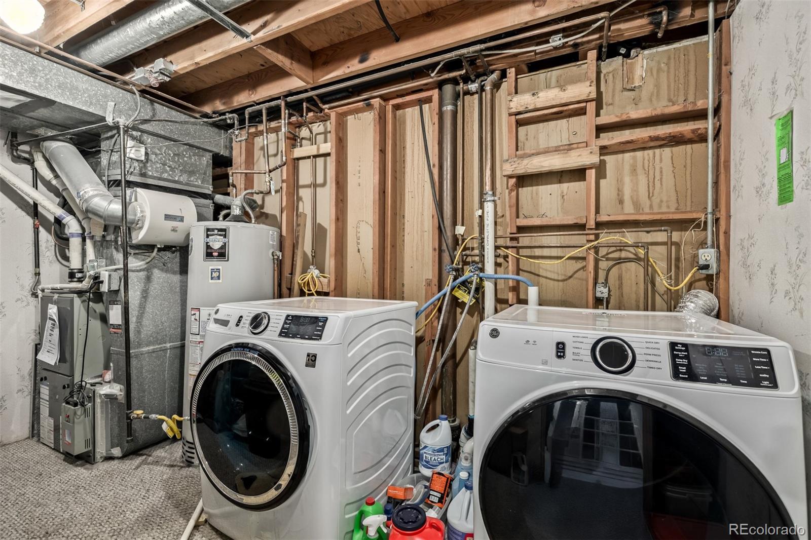 8227 Depew Way Arvada, CO 80003 - Photo 27 of 31 a utility room with dryer and washer