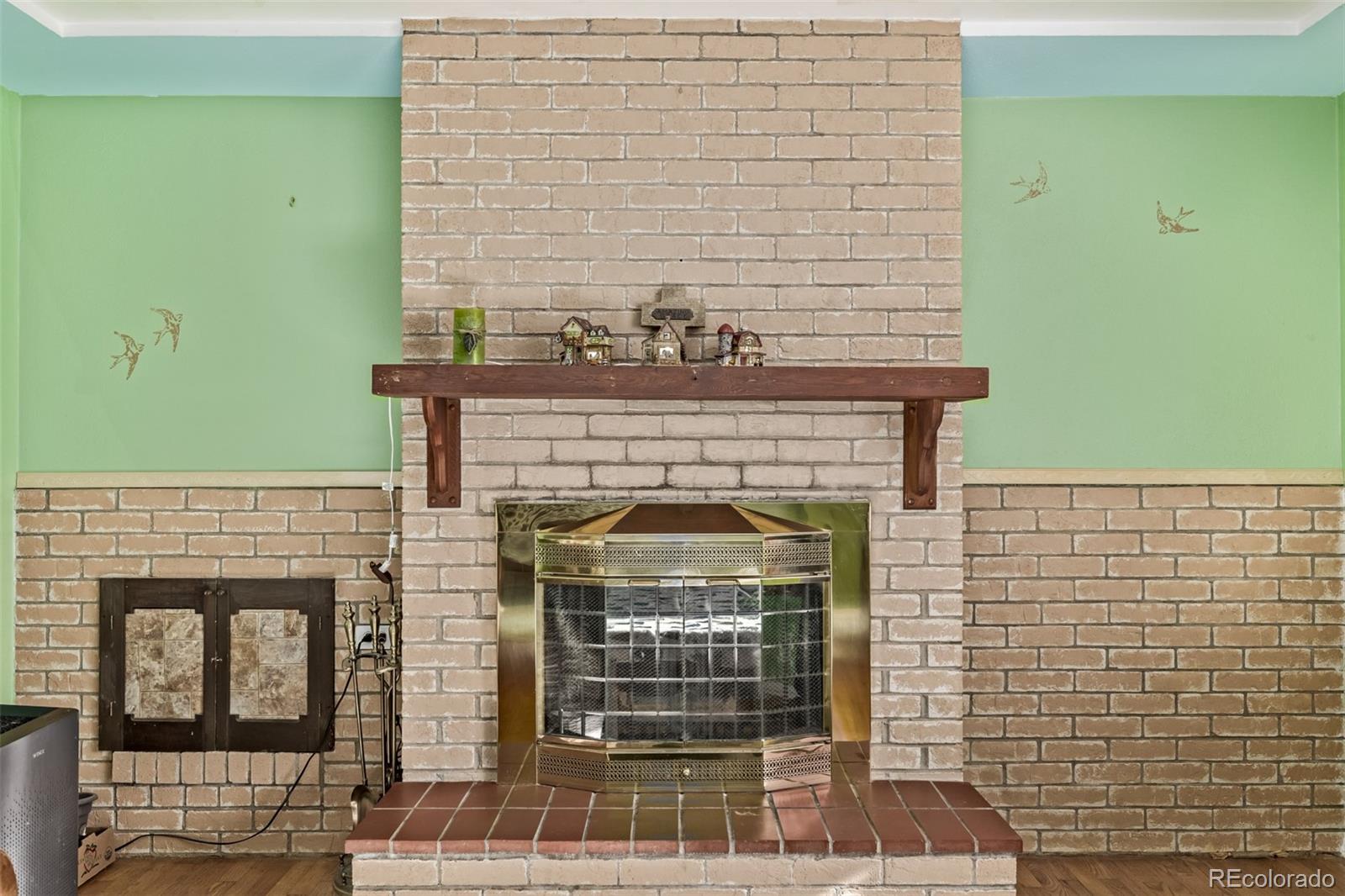 8227 Depew Way Arvada, CO 80003 - Photo 7 of 31 a front view of a house with an entrance