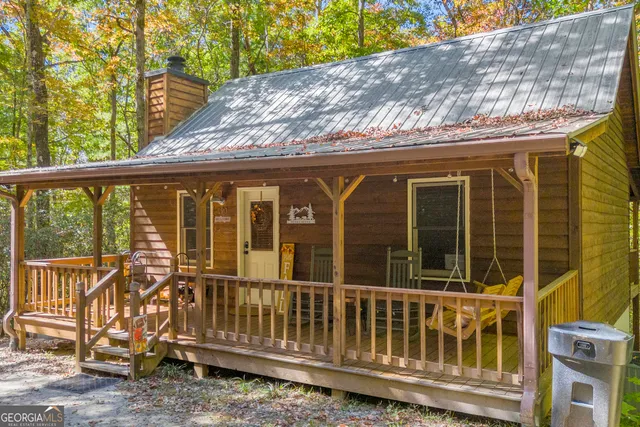 a view of a wooden house with a large window