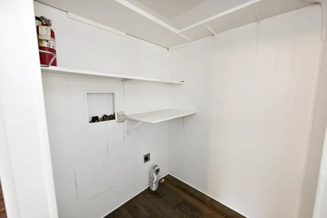 a view of a balcony with chairs