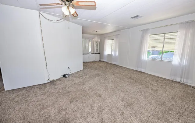 a view of entryway and kitchen