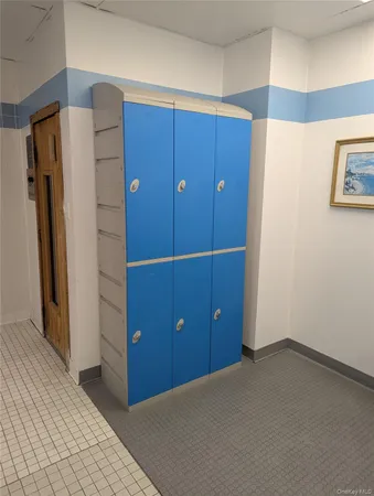 a view of a kitchen with a refrigerator