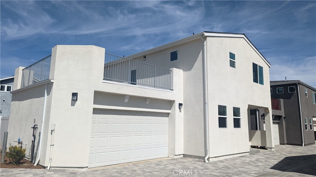 15115 Logos Court North Hills, CA 91343 - Photo 1 of 21 a front view of a house with a garage