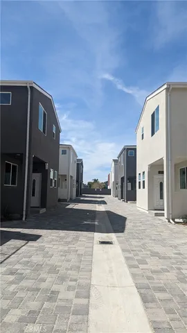 a view of a building with a street