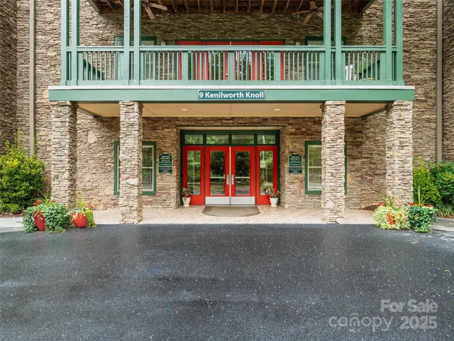 a front view of a house with a garage