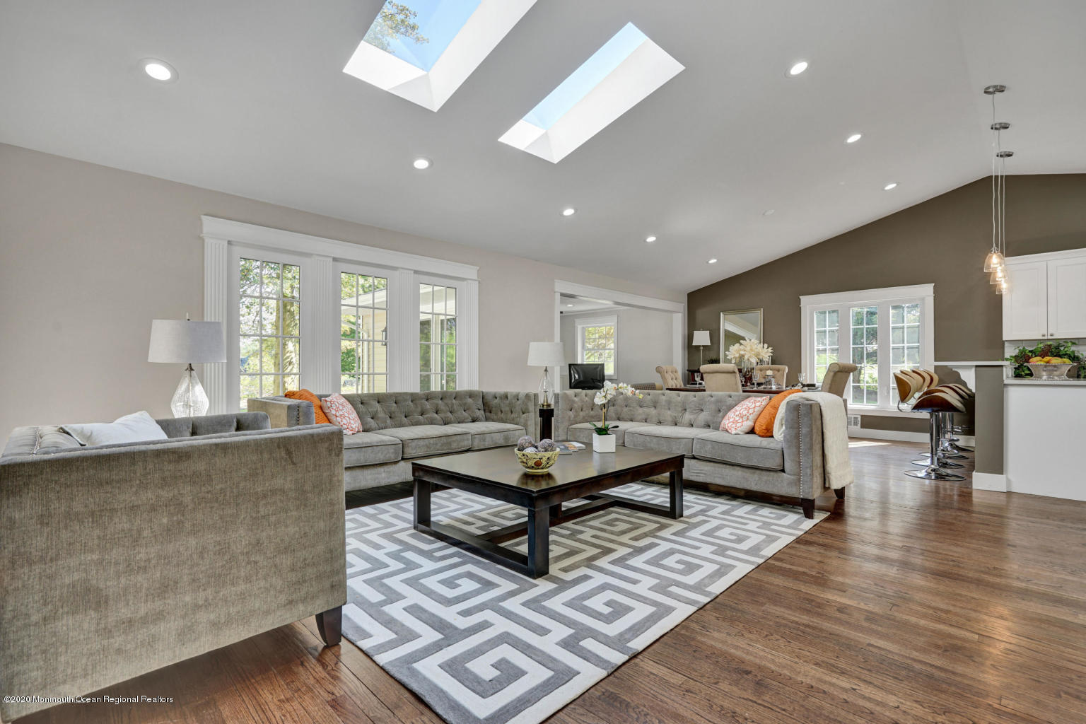 a living room with furniture and a table