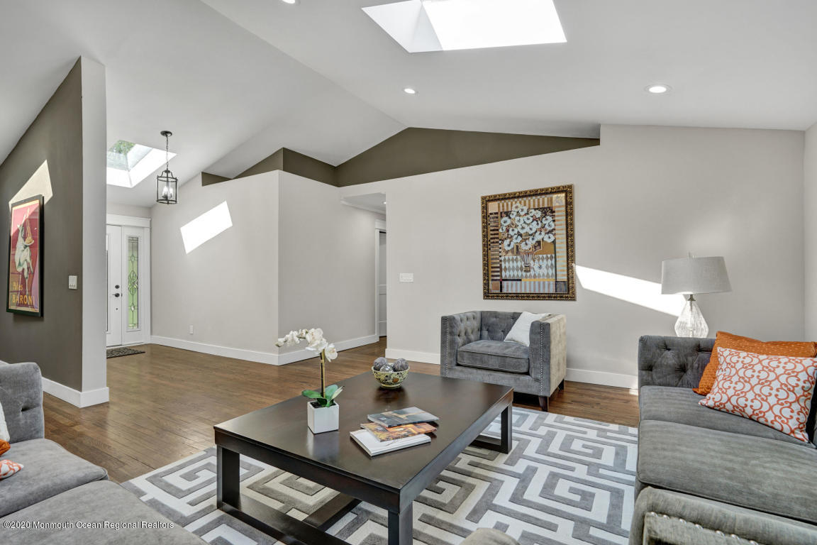 236 Holland Road Holmdel, NJ 07733 - Photo 15 of 42 a living room with furniture and wooden floor