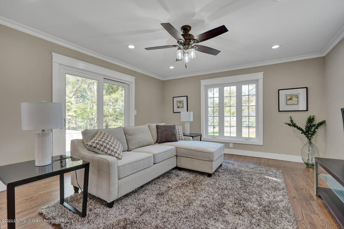 236 Holland Road Holmdel, NJ 07733 - Photo 16 of 42 a living room with furniture and a window