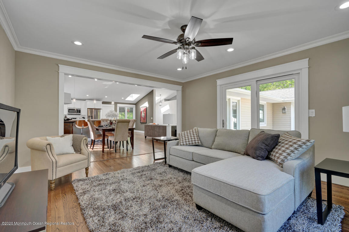 236 Holland Road Holmdel, NJ 07733 - Photo 17 of 42 a living room with furniture and a large window