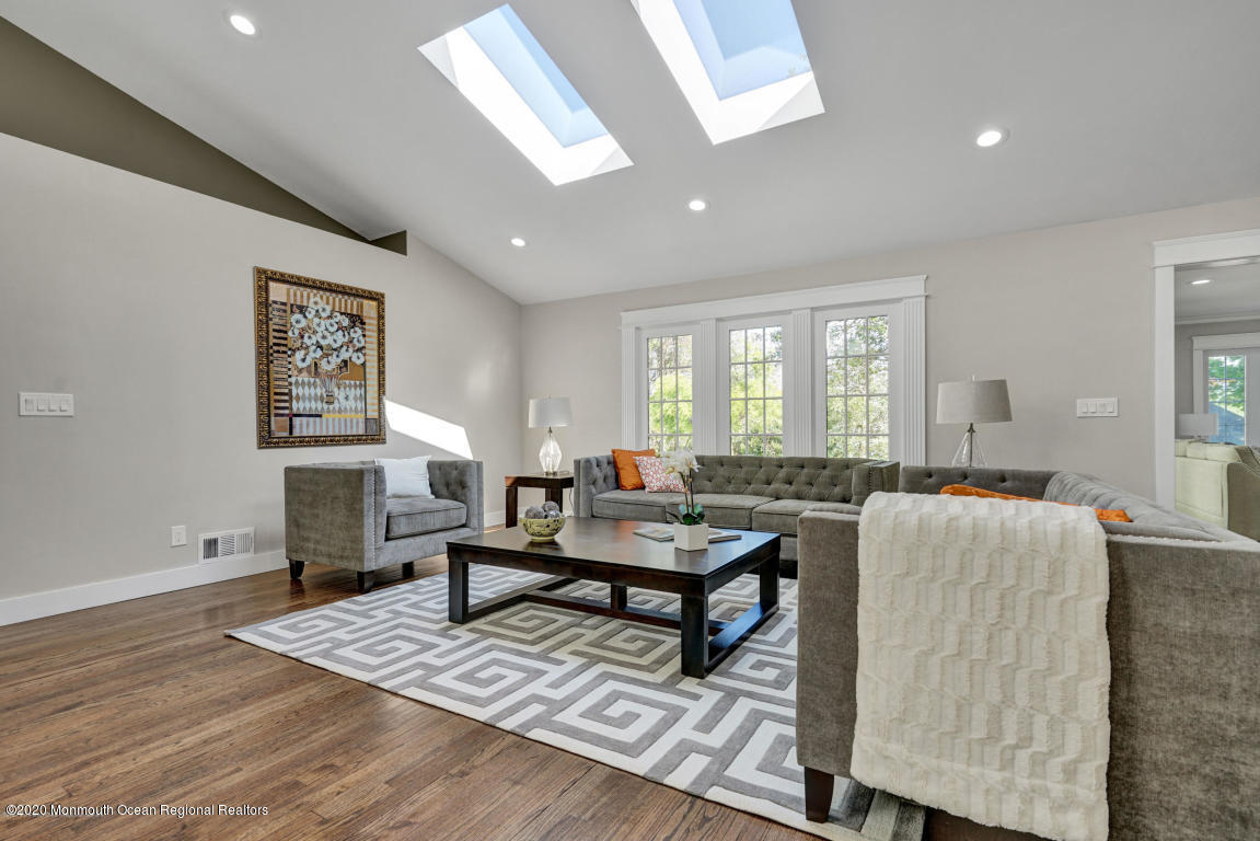 236 Holland Road Holmdel, NJ 07733 - Photo 3 of 42 a living room with furniture and wooden floor