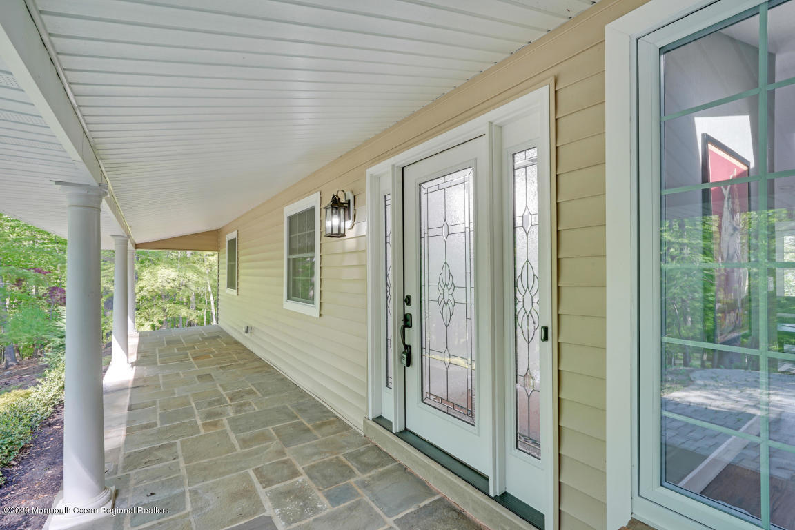 236 Holland Road Holmdel, NJ 07733 - Photo 34 of 42 a view of a porch