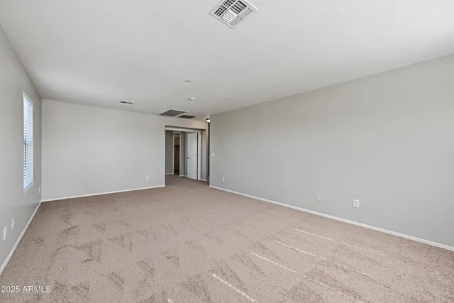 an empty room with an entryway