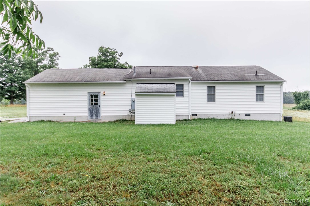 4725 Grubby Road Wilsons, VA 23894 - Photo 9 of 40 a view of a backyard with a garden