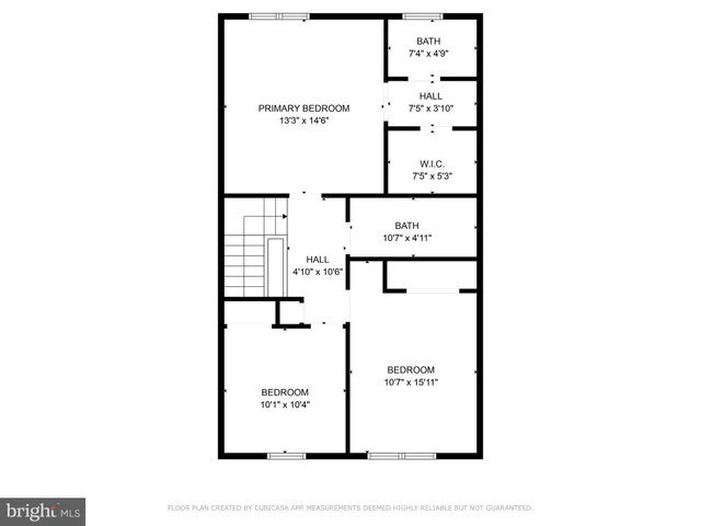 a picture of a bench in front of a wall