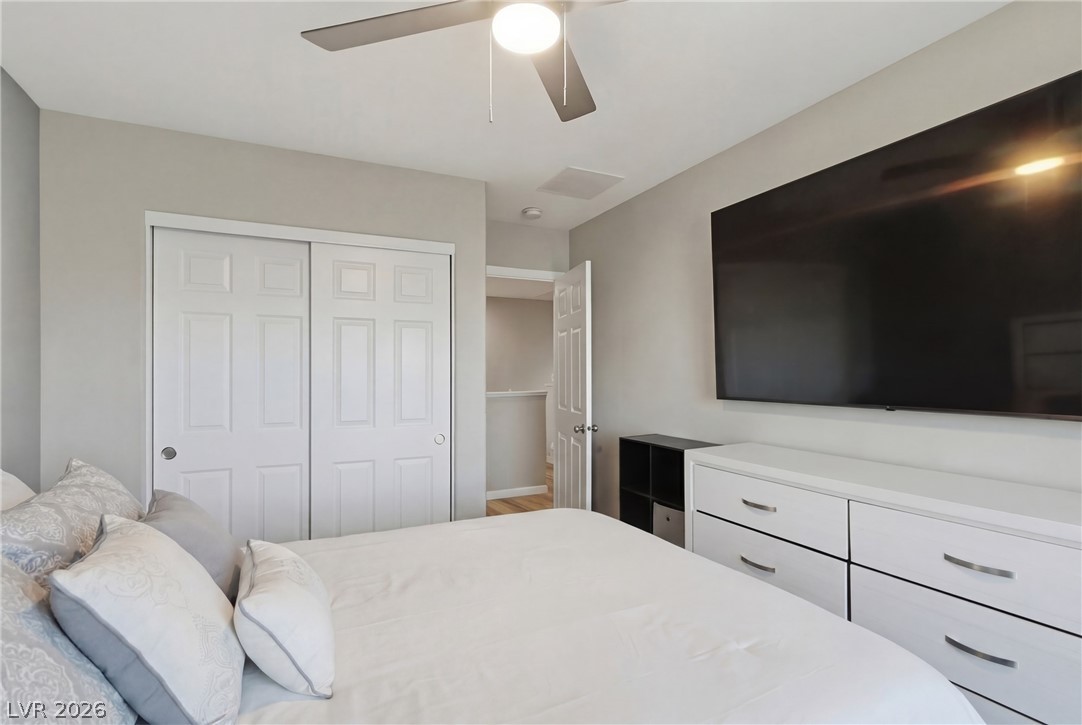 1921 Miller Ridge Avenue North Las Vegas, NV 89031 - Photo 16 of 26 This cozy bedroom features a spacious closet, offering practical living and comfort.