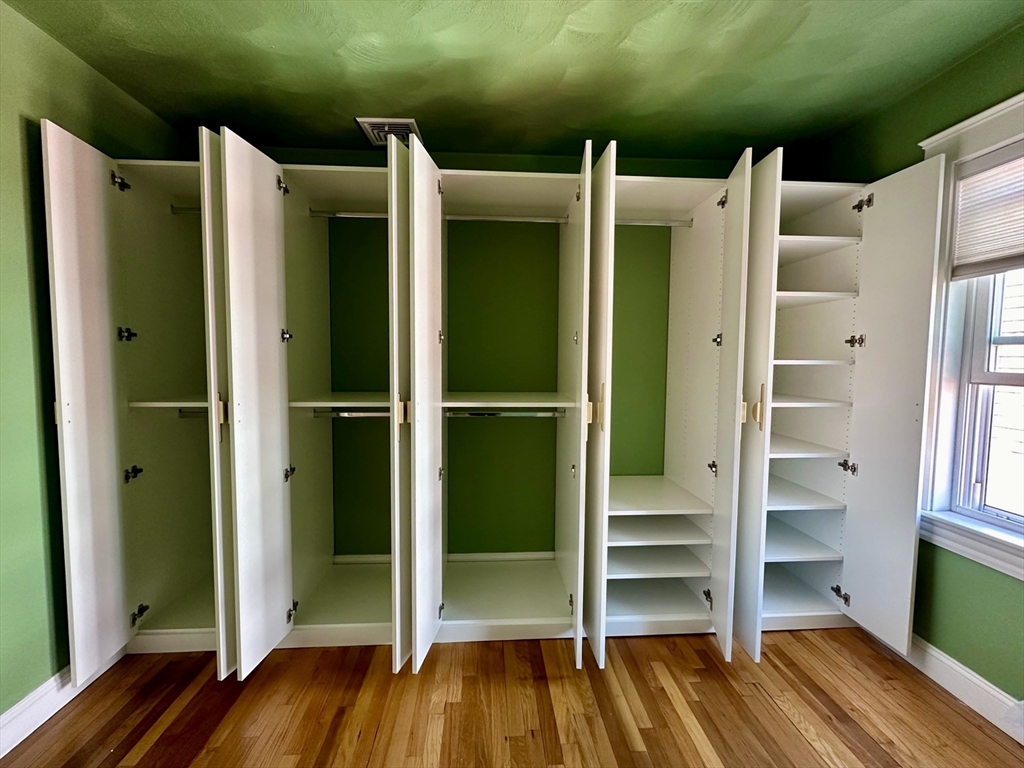24 Thelma Road, Unit PH Boston, MA 02122 - Photo 11 of 17 a refrigerator freezer sitting inside of a kitchen