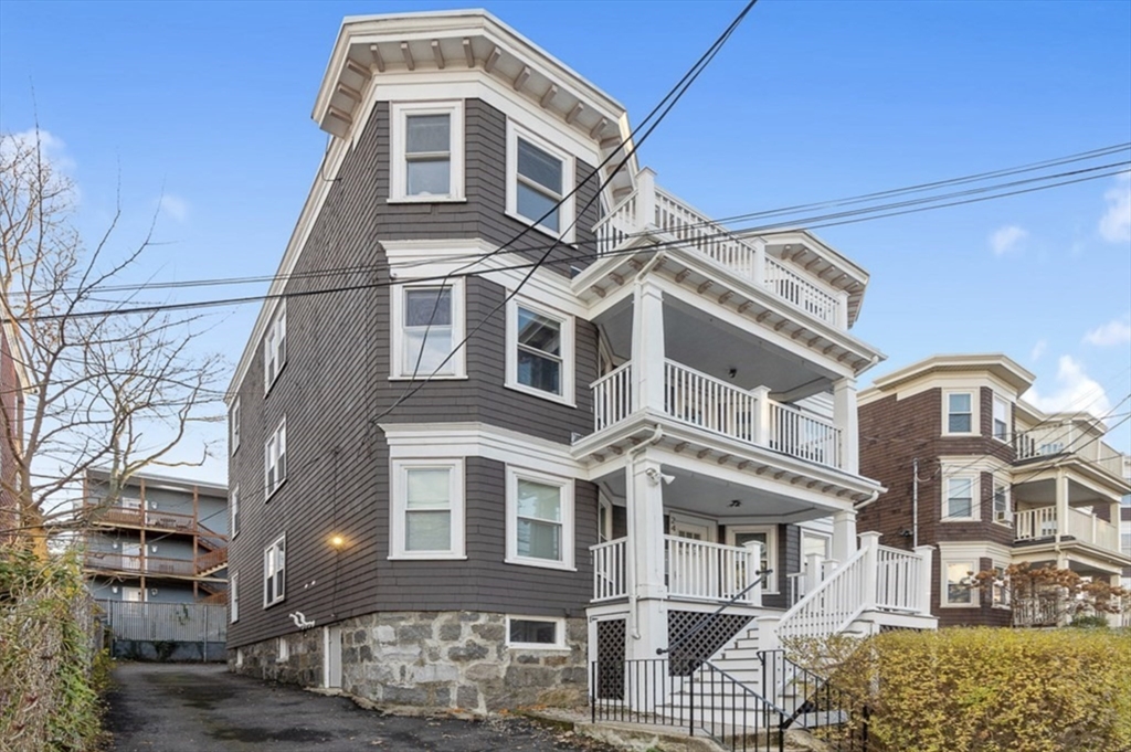 24 Thelma Road, Unit PH Boston, MA 02122 - Photo 17 of 17 a front view of a residential apartment building