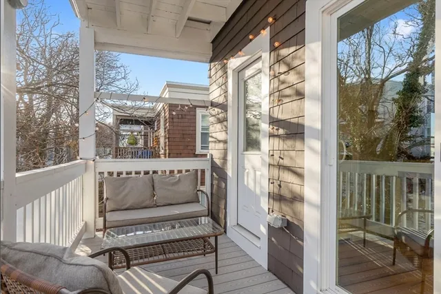 a view of balcony with furniture
