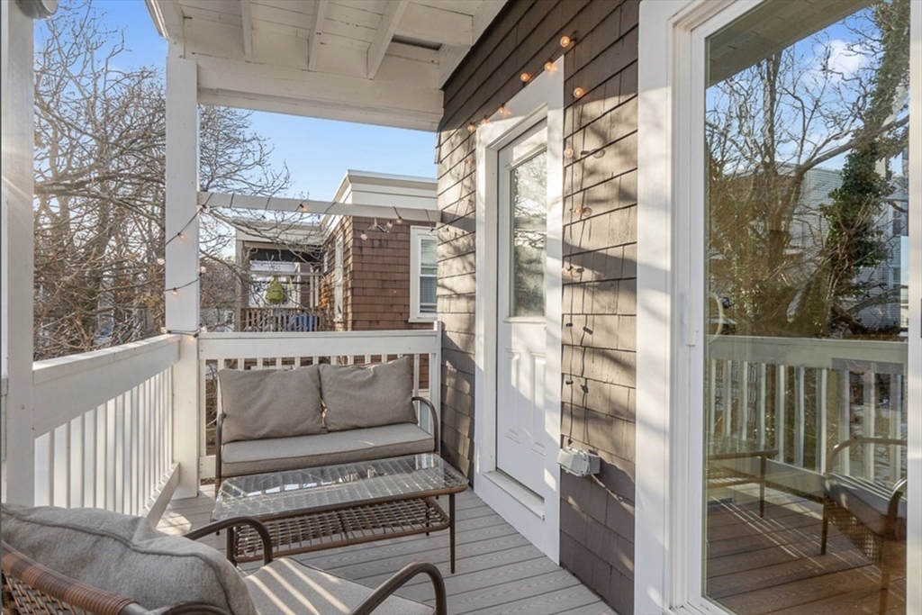 24 Thelma Road, Unit PH Boston, MA 02122 - Photo 7 of 17 a view of balcony with furniture