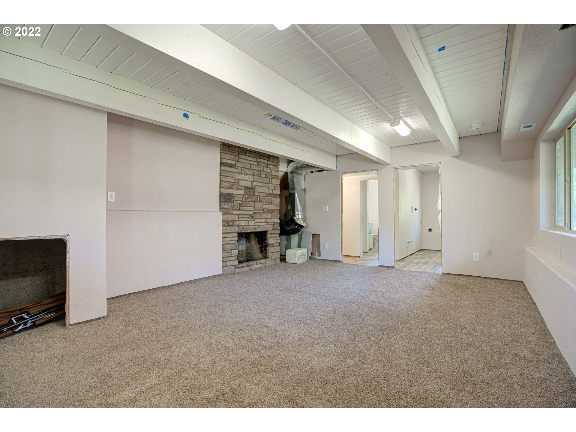 12355 Southeast Winston Road Damascus, OR 97089 - Photo 19 of 27 a view of empty room with fireplace