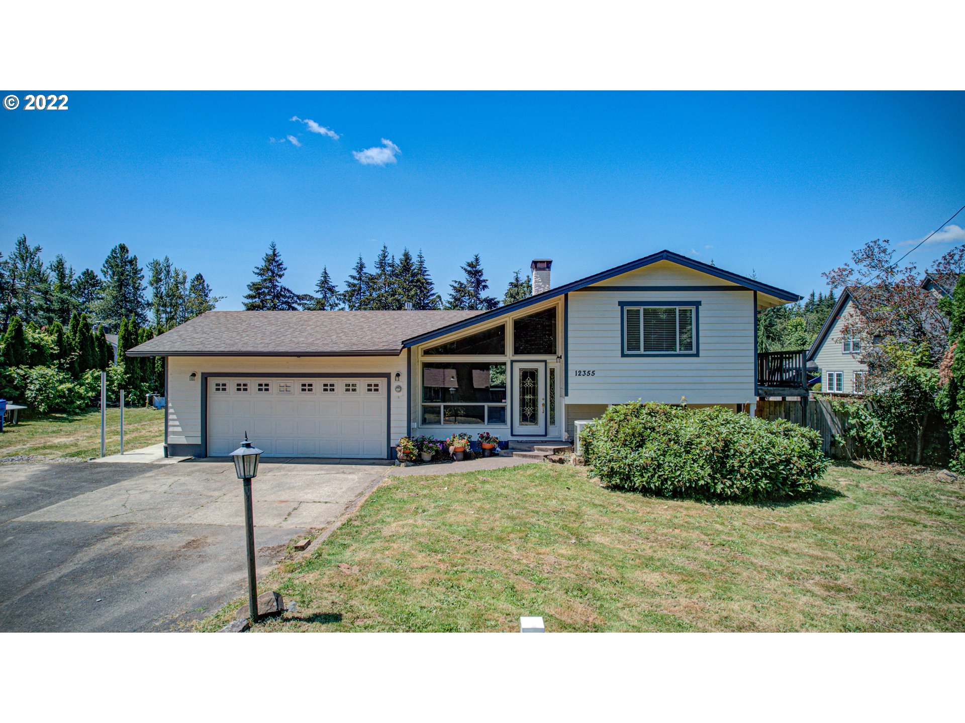 12355 Southeast Winston Road Damascus, OR 97089 - Photo 2 of 27 a black and white photo of a house