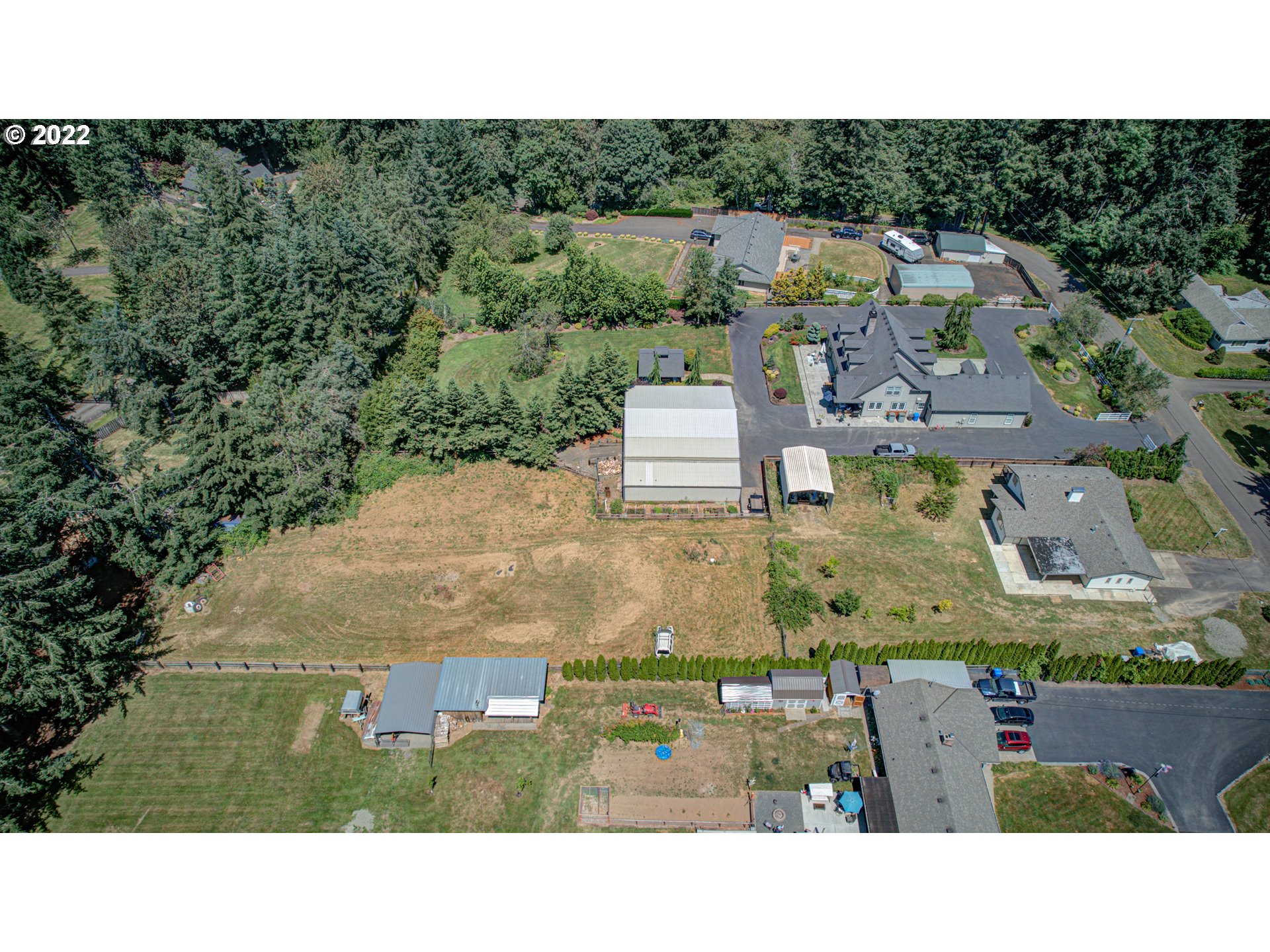 12355 Southeast Winston Road Damascus, OR 97089 - Photo 5 of 27 an aerial view of a house with a yard