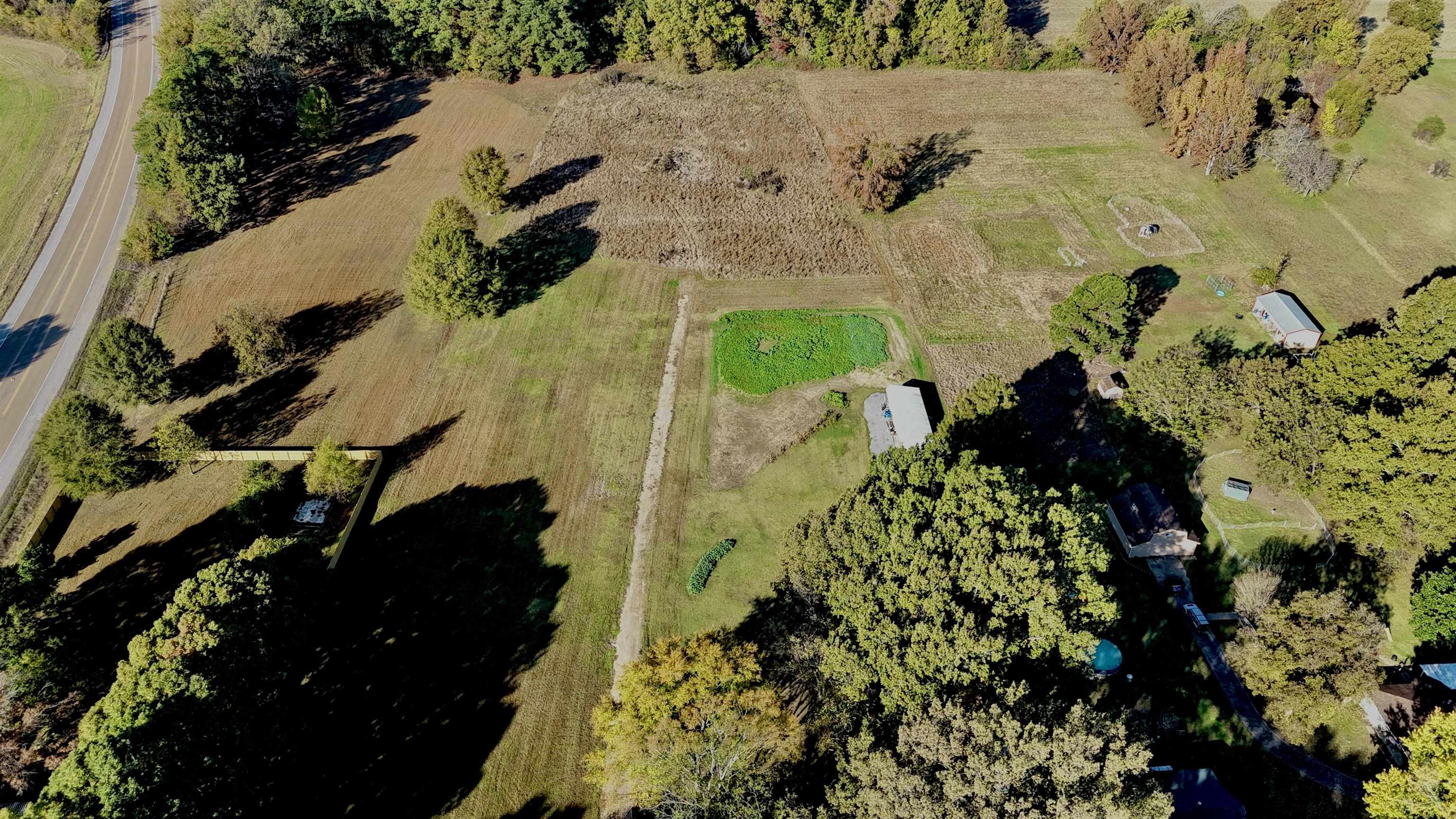 0 Rosemark Road Millington, TN 38053 - Photo 2 of 6 Overview of rural landscape featuring a tree filled landscape