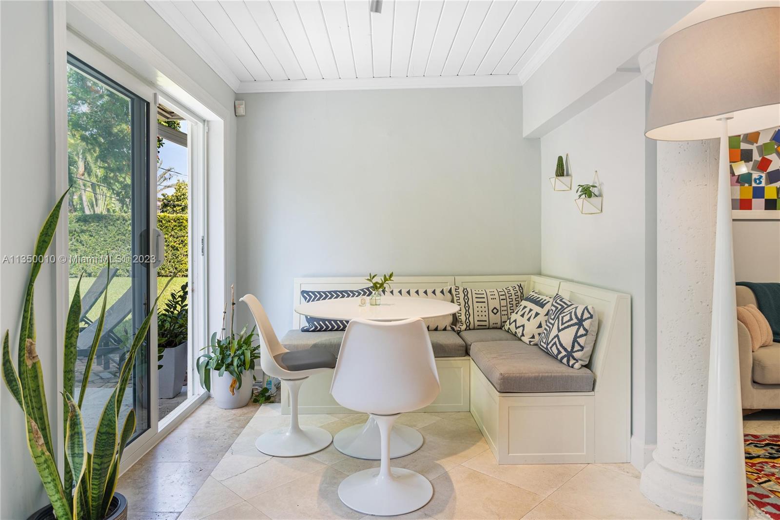 441 Miller Road Coral Gables, FL 33146 - Photo 14 of 34 a view of a dining room with furniture window and outside view