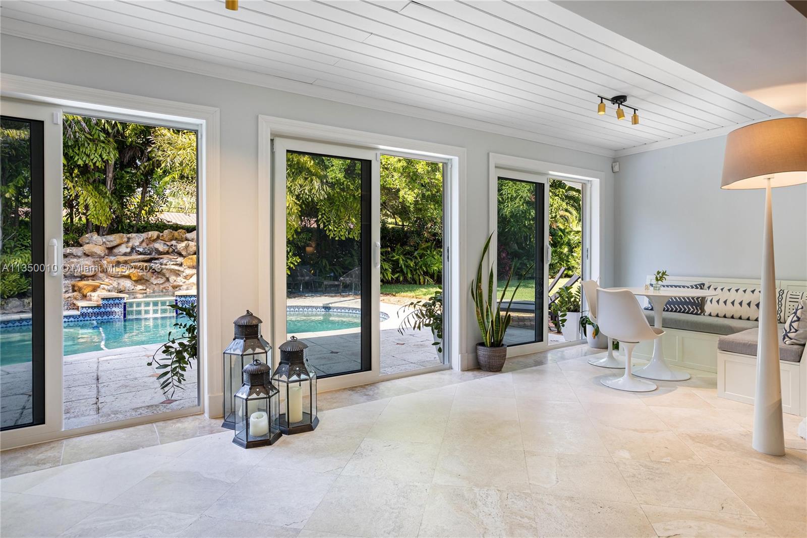 441 Miller Road Coral Gables, FL 33146 - Photo 15 of 34 a building outdoor space with windows and outdoor view