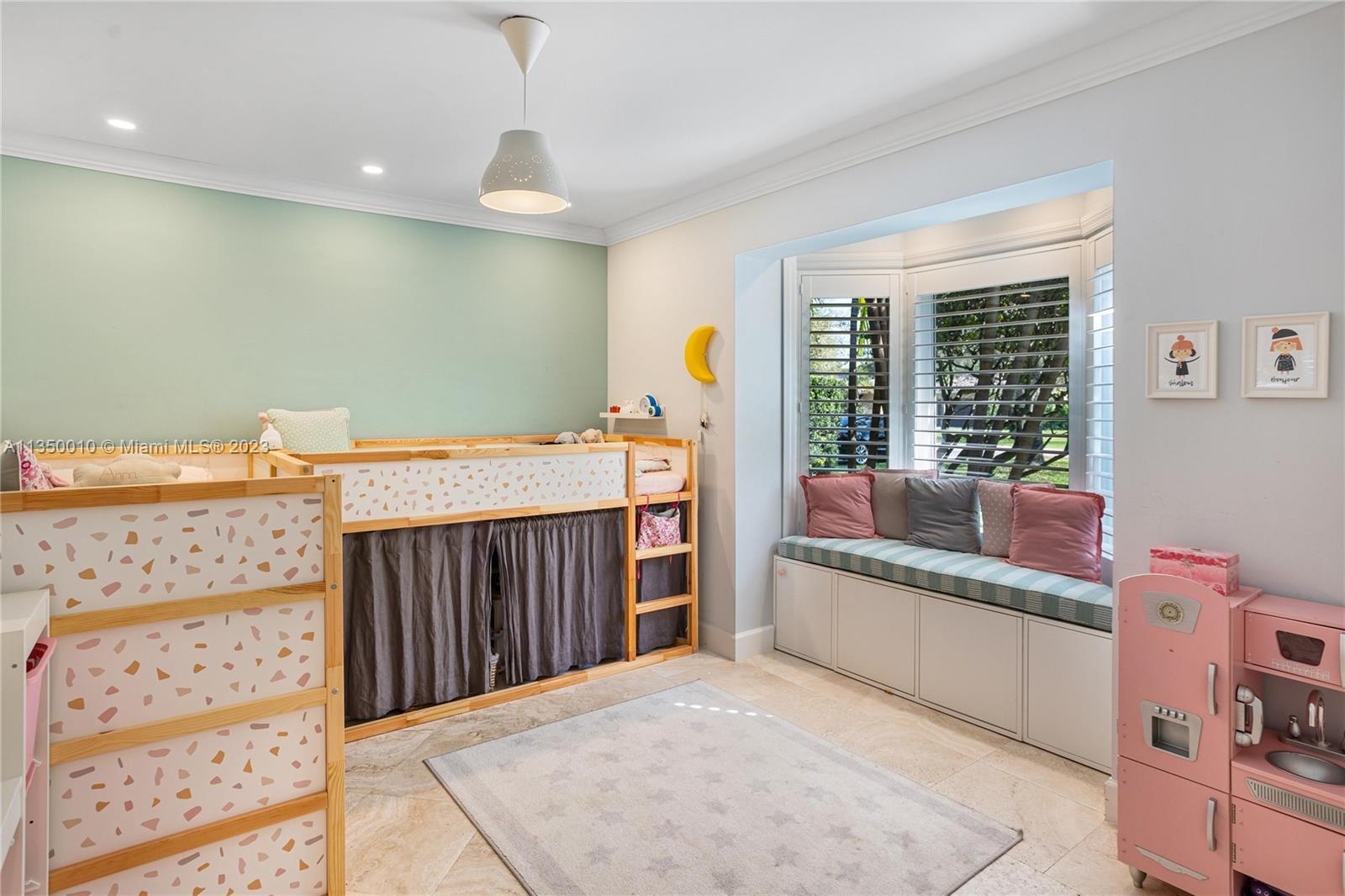 441 Miller Road Coral Gables, FL 33146 - Photo 21 of 34 a bedroom with a bed and a large window