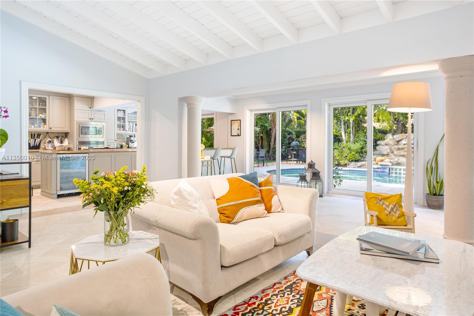 441 Miller Road Coral Gables, FL 33146 - Photo 4 of 34 a living room with furniture and a large window