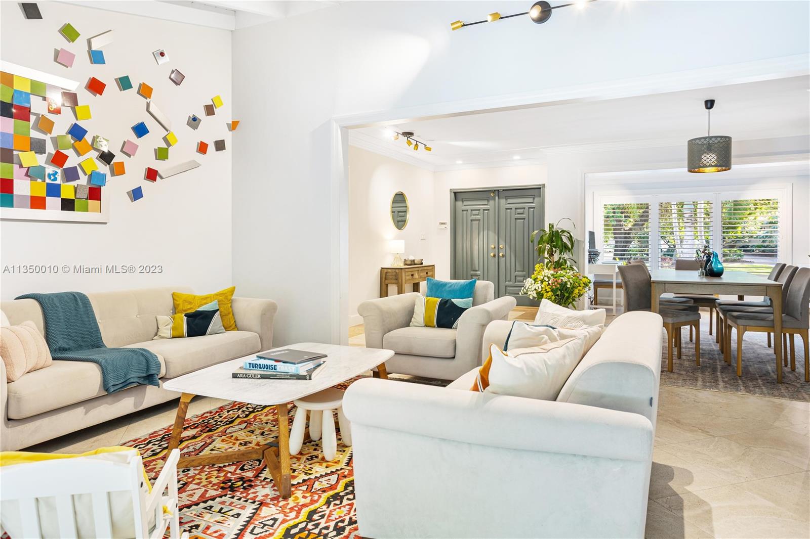 441 Miller Road Coral Gables, FL 33146 - Photo 6 of 34 a living room with furniture and painting on the wall