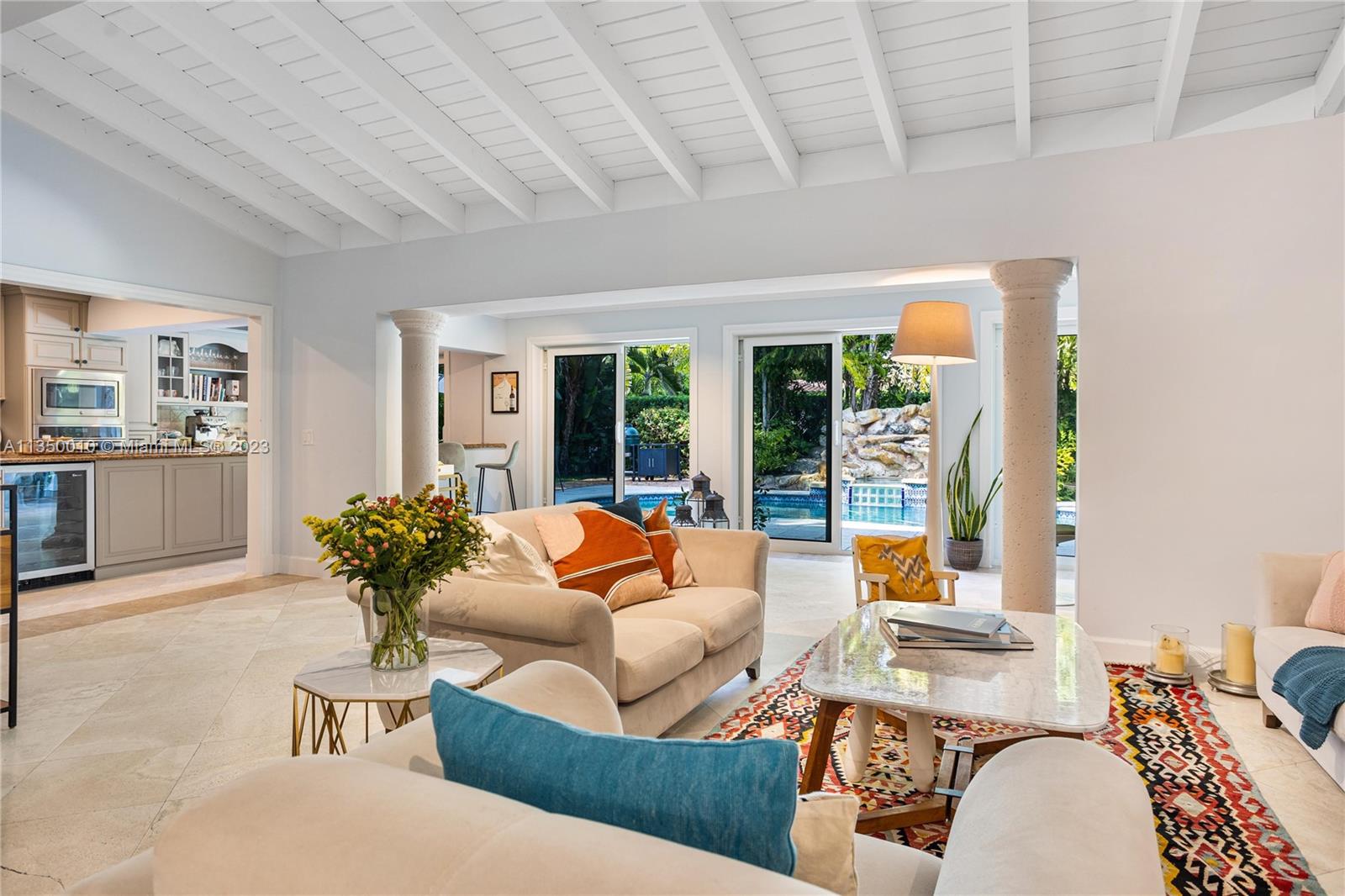 441 Miller Road Coral Gables, FL 33146 - Photo 10 of 34 a living room with furniture and a large window