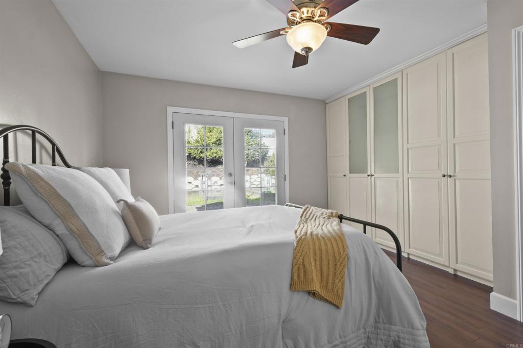 10036 3 Oaks Way Santee, CA 92071 - Photo 18 of 36 a bed sitting in a bedroom next to a window