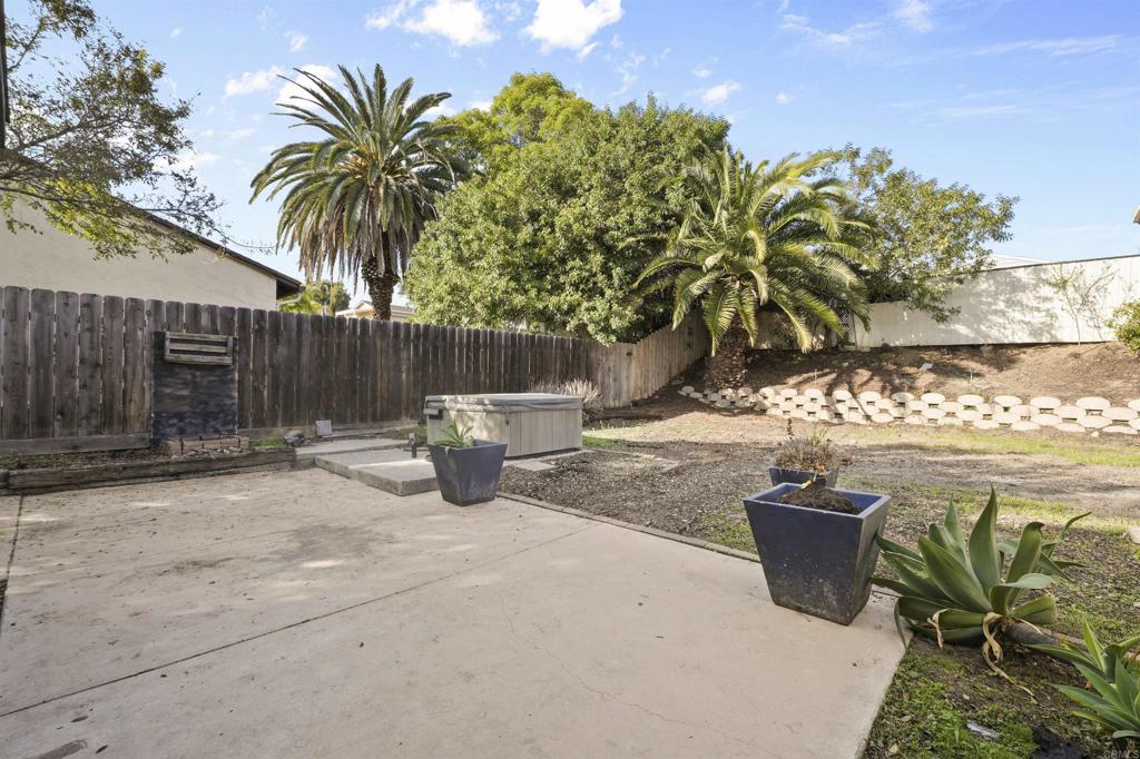 10036 3 Oaks Way Santee, CA 92071 - Photo 29 of 36 a view of a terrace with a garden