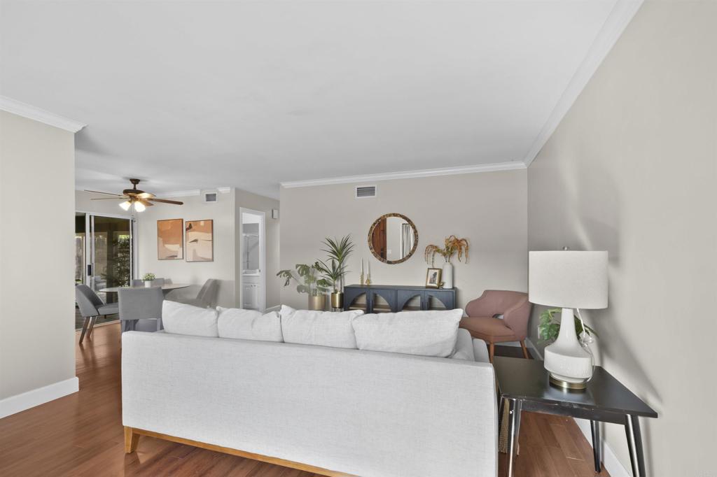 10036 3 Oaks Way Santee, CA 92071 - Photo 8 of 36 a living room with furniture a mirror and lamp