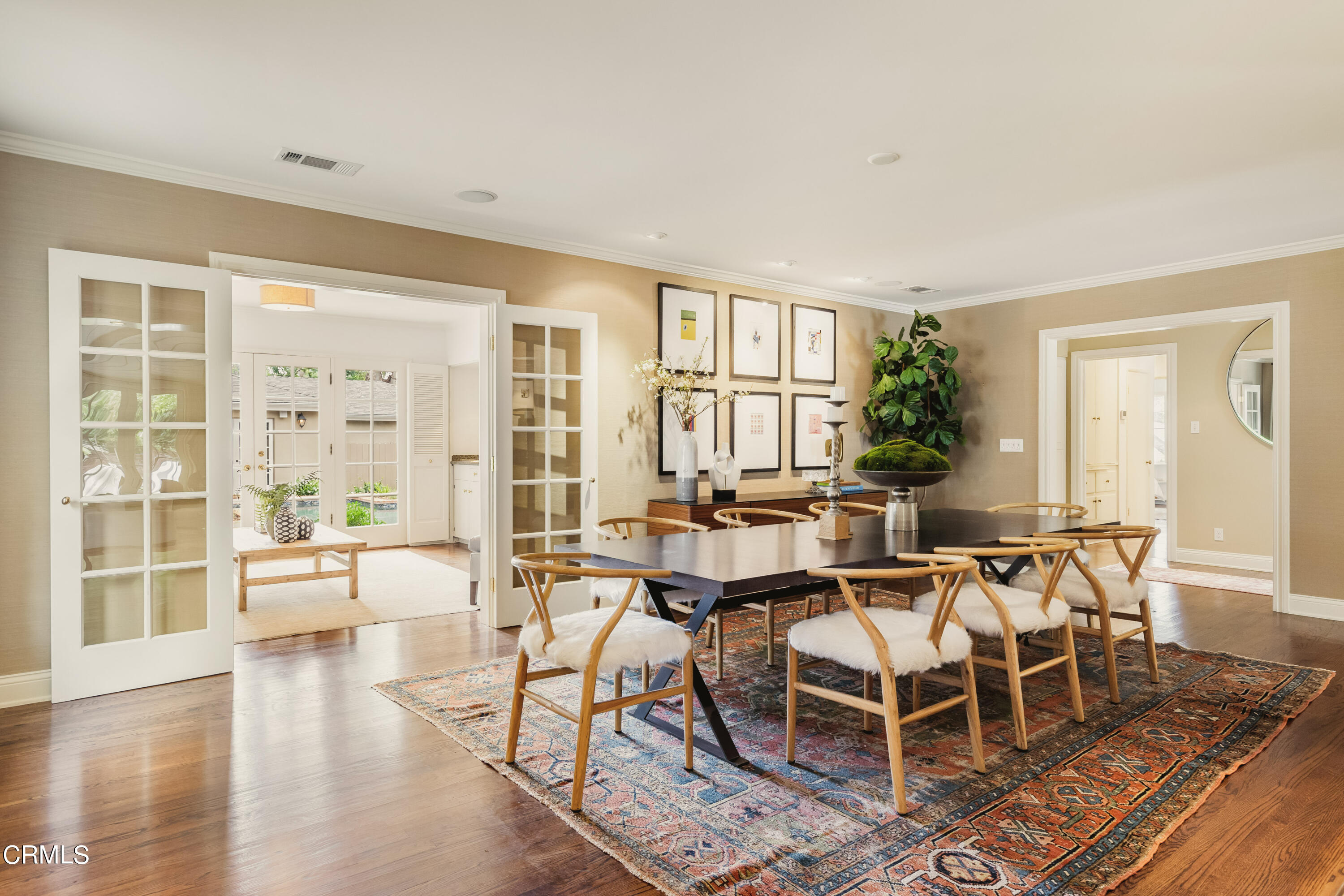 1100 Hermosa Road Pasadena, CA 91105 - Photo 3 of 17 a dining room with wooden floor and large windows