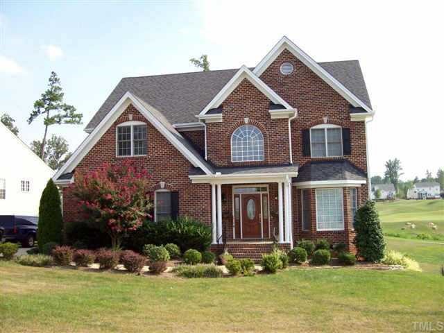 435 Competition Raleigh, NC 27603 - Photo 1 of 5 a front view of a house with garden