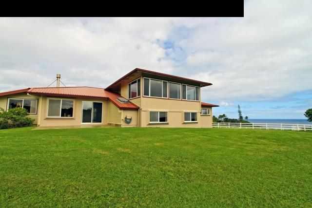342 Kulike Road, Unit 1 Haiku, HI 96708 - Photo 16 of 30 a front view of a house with a garden