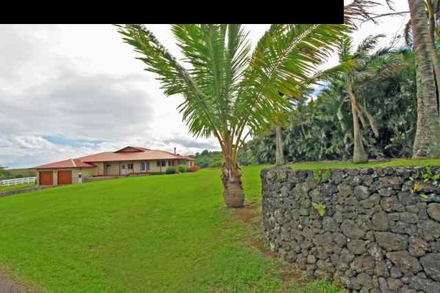 342 Kulike Road, Unit 1 Haiku, HI 96708 - Photo 21 of 30 a view of a garden with a tree in front of it